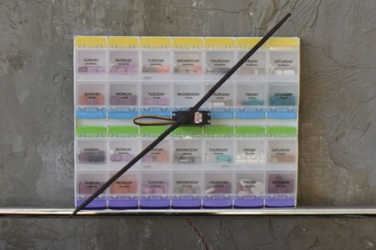 Escape Clause — pill clock installation, New York Horological Society