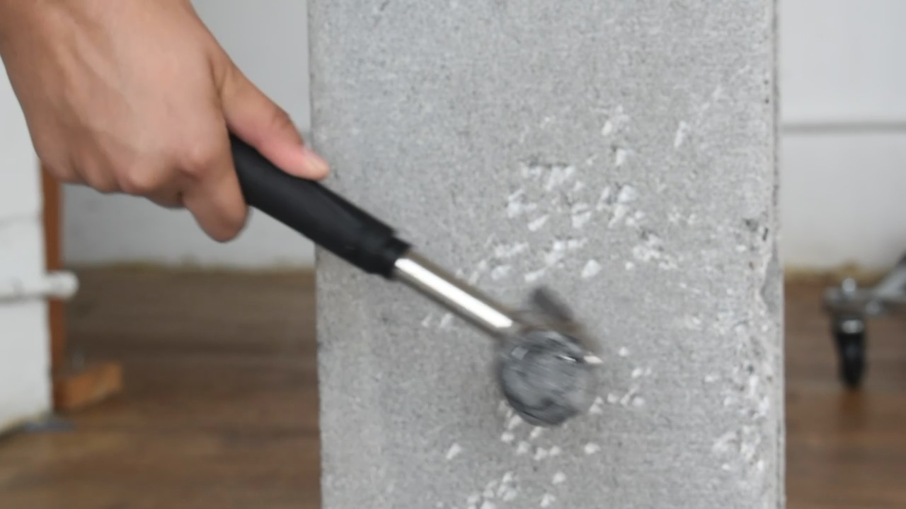 Rhetoric at Arms — smashed cement installation, Bobst Library